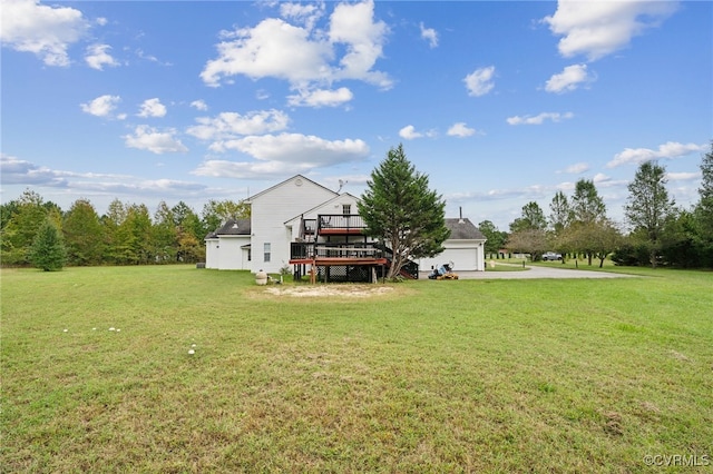 view of yard with a wooden deck