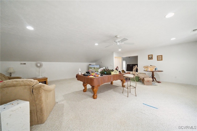 playroom with ceiling fan, light colored carpet, and vaulted ceiling