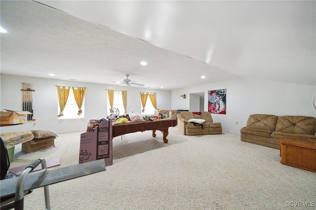 recreation room featuring ceiling fan, light colored carpet, and lofted ceiling