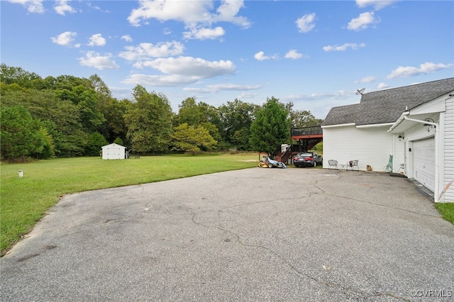 view of patio / terrace with a garage