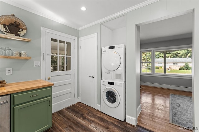 laundry area featuring ornamental molding, stacked washer and dryer, and dark hardwood / wood-style floors