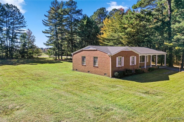 view of property exterior with a lawn