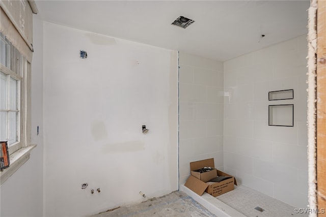 bathroom featuring a shower