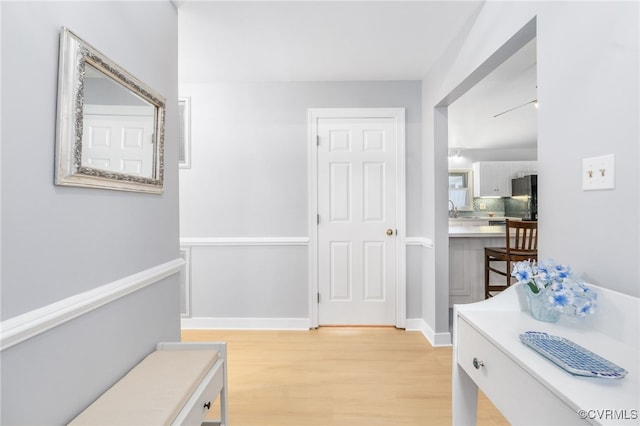 corridor featuring light hardwood / wood-style flooring