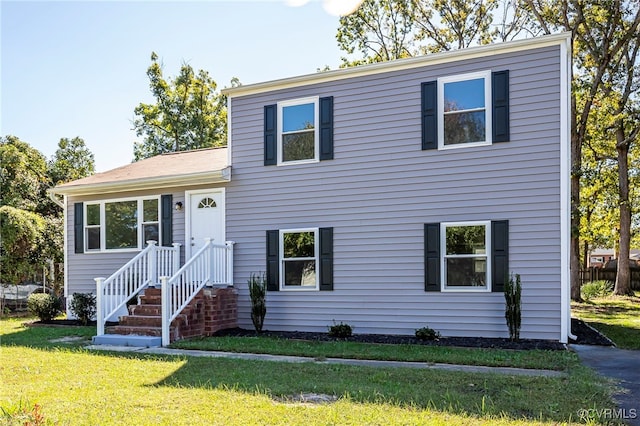 view of front facade with a front lawn