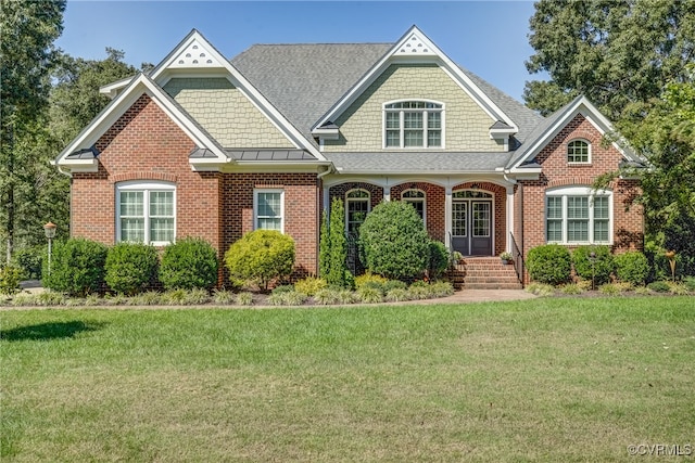 view of front of home with a front lawn