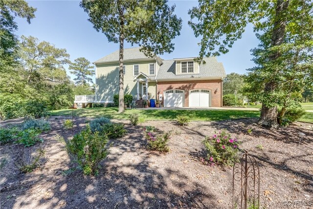 view of front of property featuring a garage