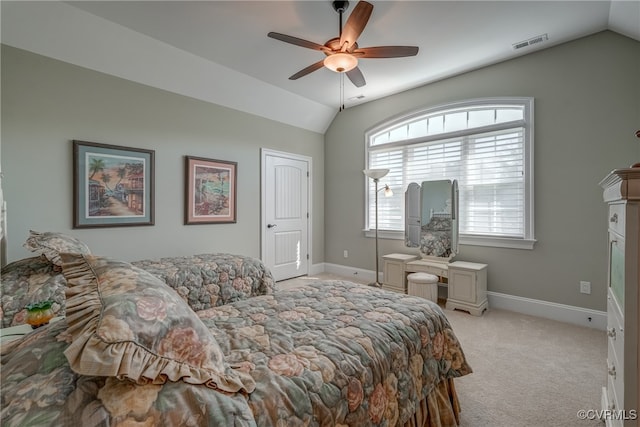 bedroom featuring ceiling fan, light colored carpet, and lofted ceiling