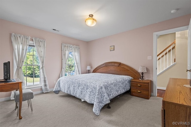 bedroom featuring carpet