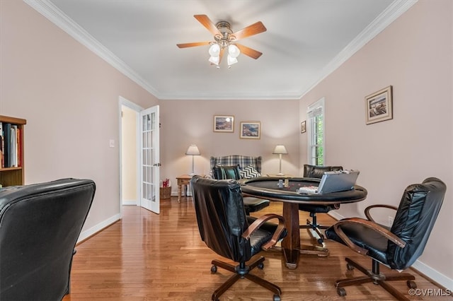 home office with french doors, light hardwood / wood-style floors, ceiling fan, and ornamental molding