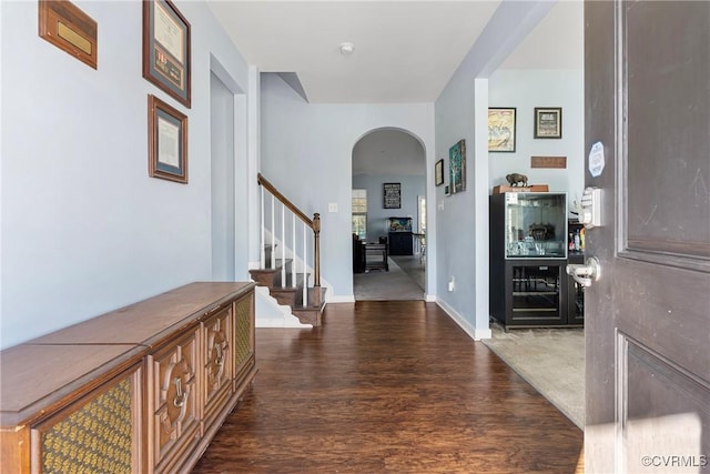 entrance foyer featuring dark wood-type flooring