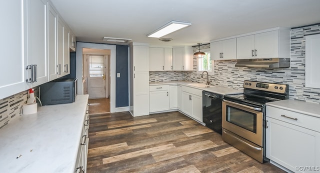 kitchen with white cabinets, black dishwasher, electric range, and range hood