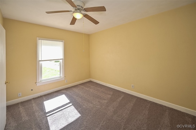 carpeted empty room with ceiling fan