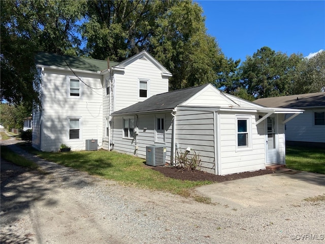 rear view of house with central AC