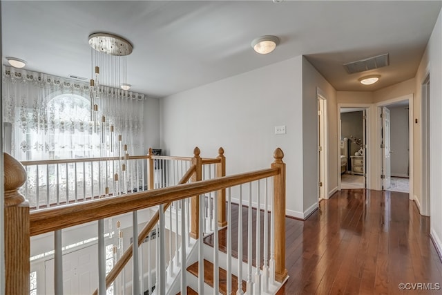 hall with dark hardwood / wood-style floors