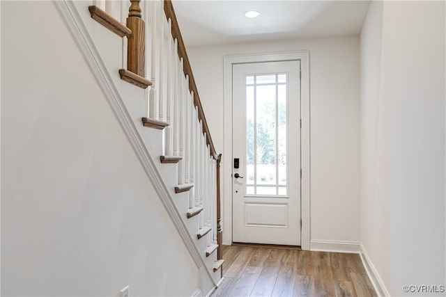 doorway with light hardwood / wood-style flooring