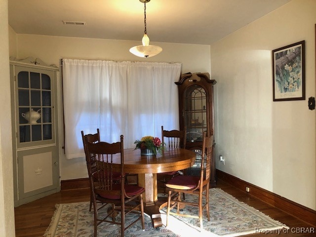 dining room featuring hardwood / wood-style flooring