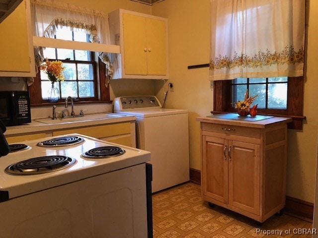 kitchen featuring white electric range, washer / clothes dryer, and sink