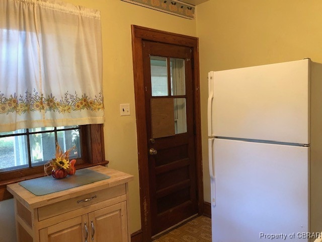 kitchen featuring white refrigerator