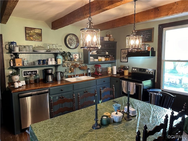 kitchen with stainless steel appliances, pendant lighting, range hood, and beam ceiling