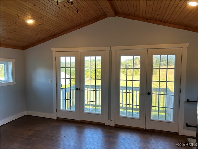 doorway featuring french doors, lofted ceiling with beams, dark wood-type flooring, and wooden ceiling