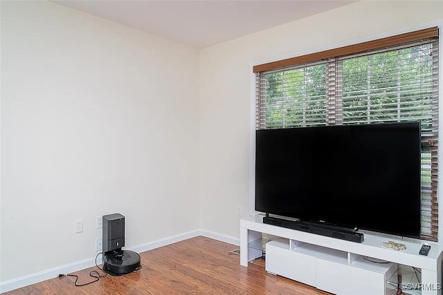 interior space with hardwood / wood-style flooring