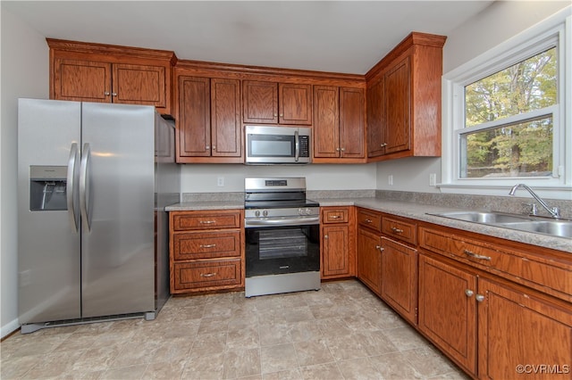 kitchen with stainless steel appliances and sink