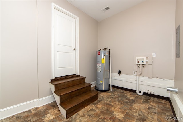 laundry room with hookup for a washing machine and electric water heater