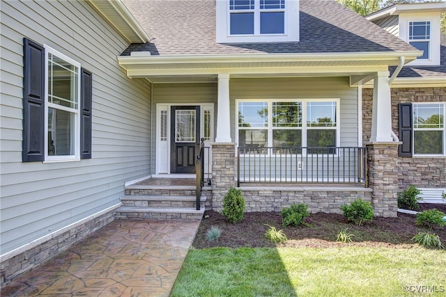 doorway to property with covered porch