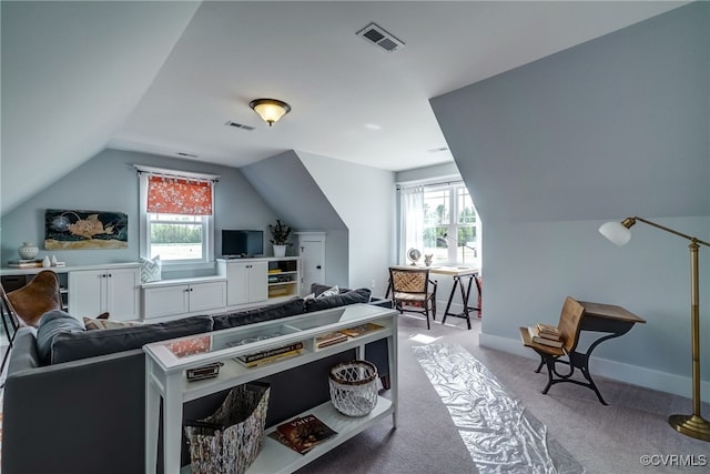 rec room featuring vaulted ceiling, a wealth of natural light, and light carpet