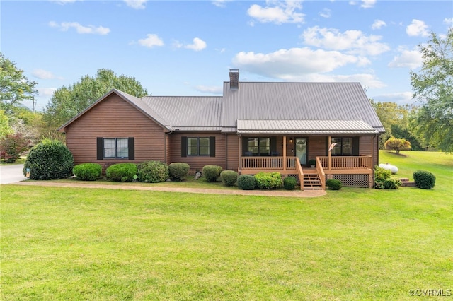 view of front of property featuring a front yard and covered porch