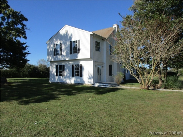 exterior space featuring a front lawn