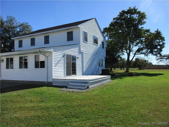1934 Farley Park Rd, Middlesex, VA 23032 - rear view of house featuring a wooden deck and a lawn