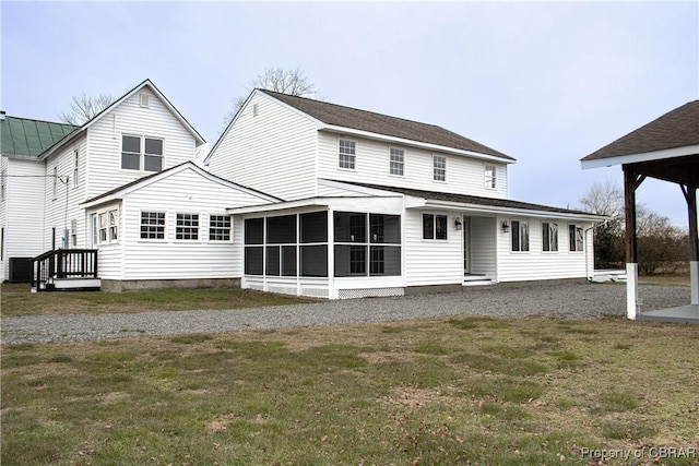 1934 Farley Park Rd, Middlesex, VA 23032 - rear view of house featuring a sunroom, a yard, and central AC unit