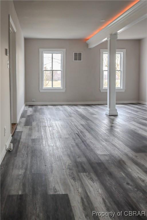 1934 Farley Park Rd, Middlesex, VA 23032 - unfurnished living room with wood finished floors and baseboards