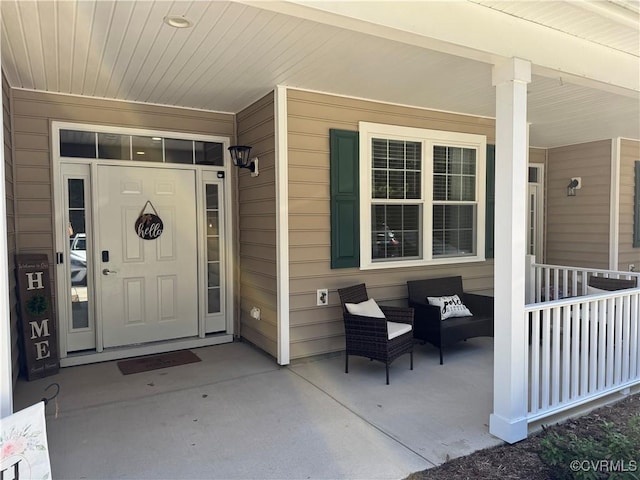 doorway to property with covered porch