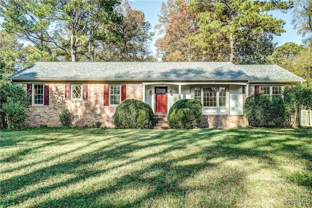 single story home featuring a front yard