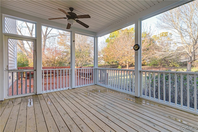 wooden deck with ceiling fan