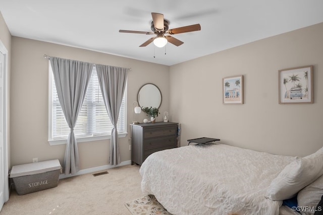 carpeted bedroom featuring ceiling fan