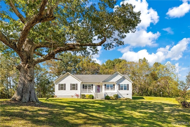 ranch-style home featuring a front yard