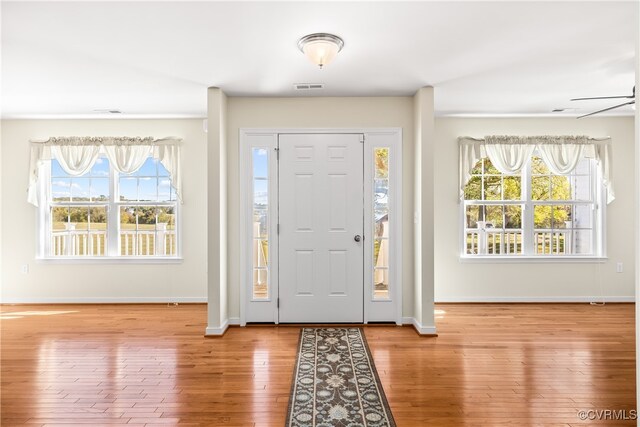 foyer entrance featuring hardwood / wood-style flooring