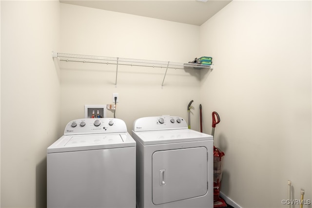 laundry area featuring washing machine and dryer