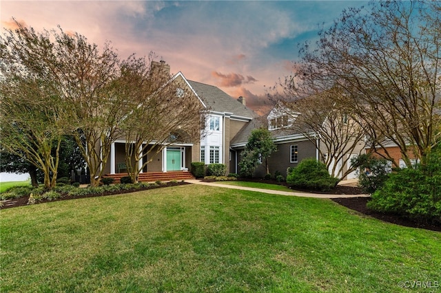 view of front of house featuring a yard