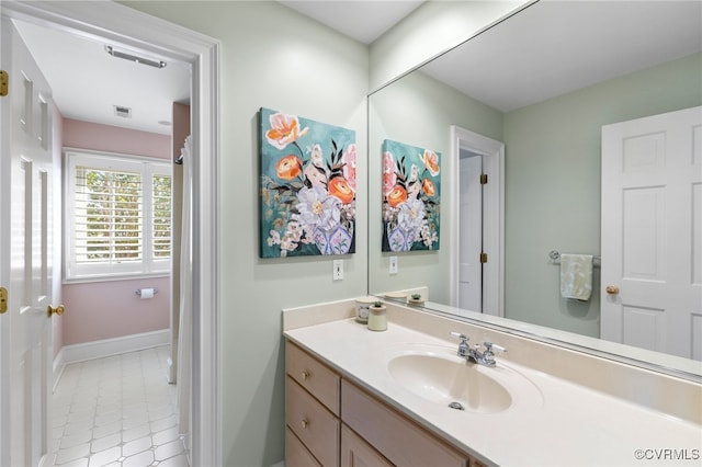 bathroom featuring vanity and tile patterned floors