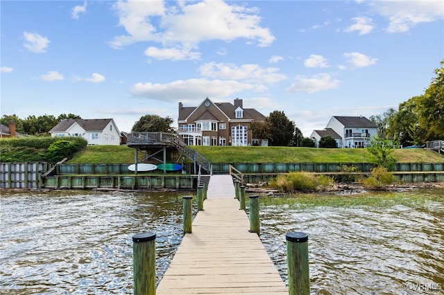 view of dock with a water view