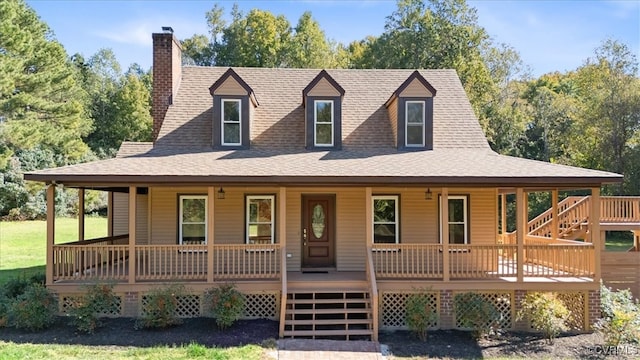 farmhouse inspired home featuring a wooden deck