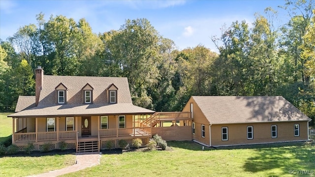 country-style home with a front yard