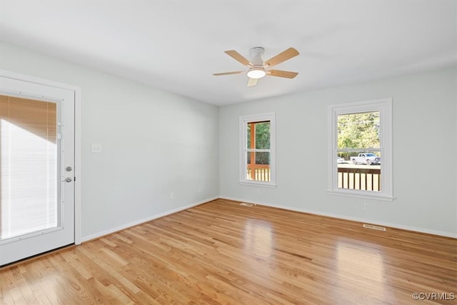 unfurnished room with light hardwood / wood-style floors and ceiling fan