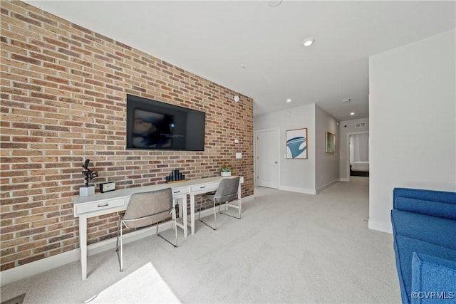 living room with light carpet, brick wall, baseboards, and recessed lighting