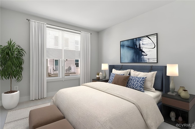 bedroom with carpet floors and baseboards